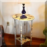 F84. Stenciled side table. 